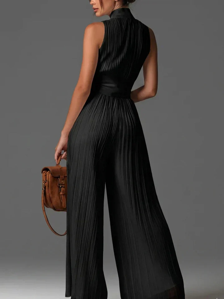 PLISSÉE JUMPSUIT MET HALTERNEK VOOR VROUWEN