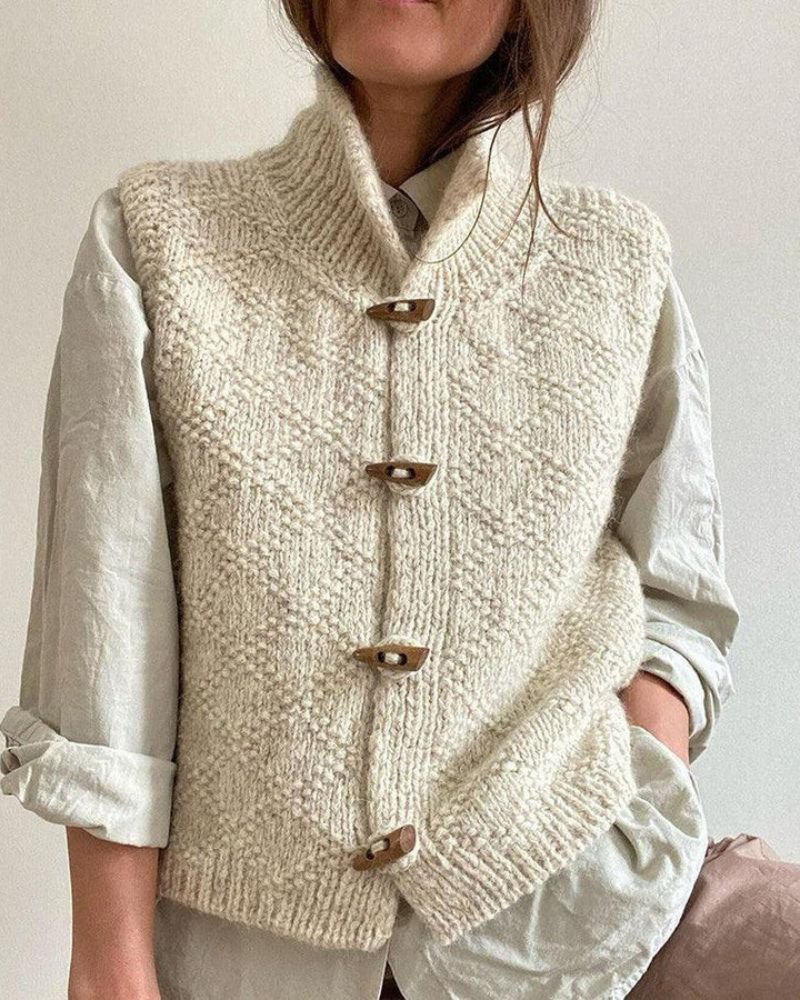 INGRID – GEZELLIGE BREI ZONDER MOUWEN CARDIGAN