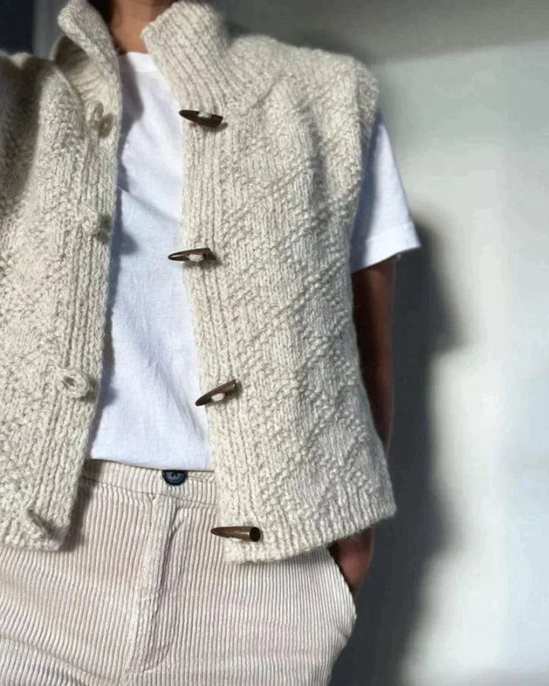INGRID – GEZELLIGE BREI ZONDER MOUWEN CARDIGAN