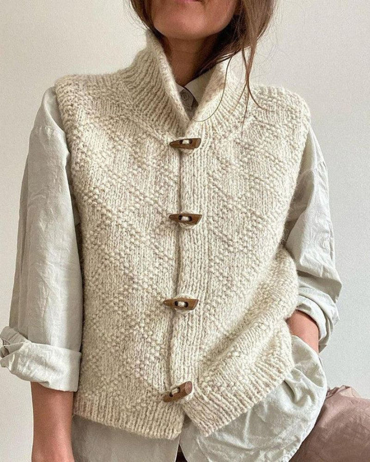 INGRID – GEZELLIGE BREI ZONDER MOUWEN CARDIGAN