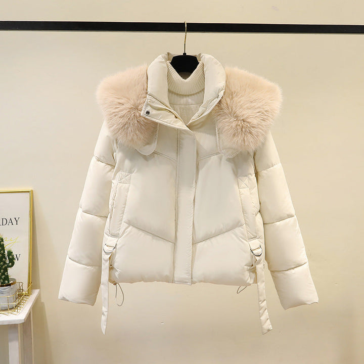Dames korte gewatteerde jas met volumineuze faux fur kraag en tailleband