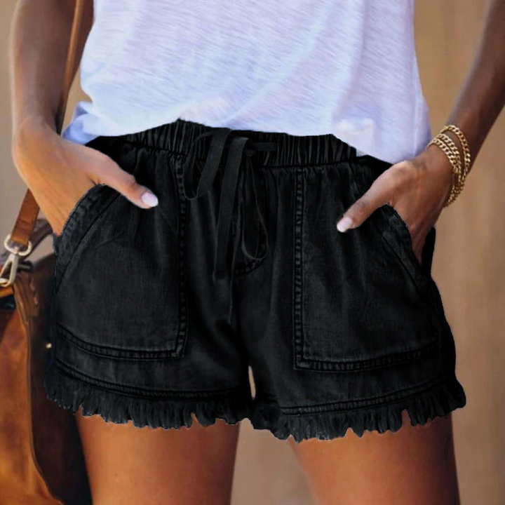 Comfortabele denim short met elastische tailleband en rafelranden