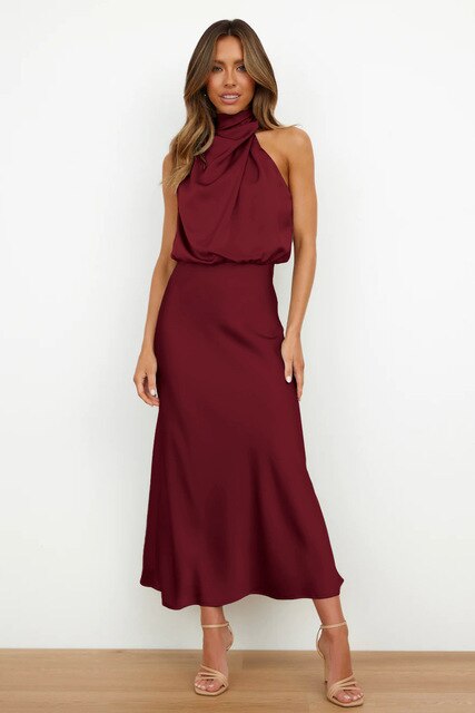 Dames maxi cocktailjurk met halternek en elegante avondlook