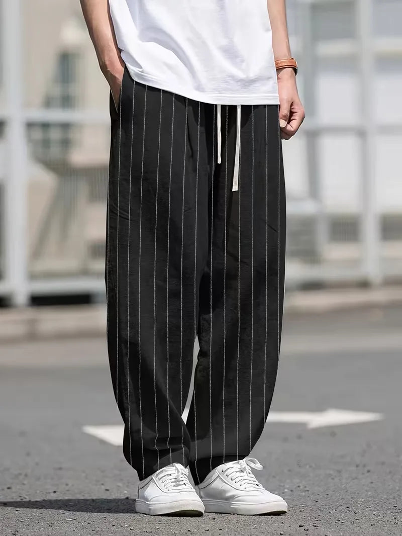 Wide fit pantalons met verticale strepen