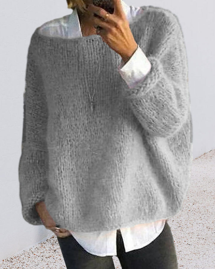 Danique Mell | Effen offshoulder pluizige trui
