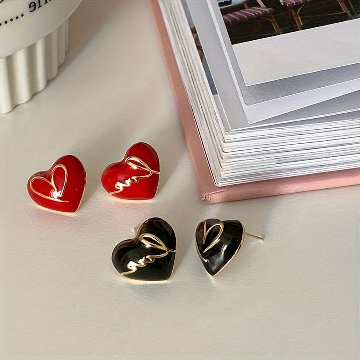 Elena | Elegante rode hart & letter asymmetrische oorbellen