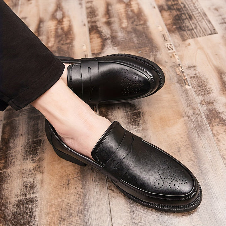 Jasper | Heren penny loaferschoenen met brogue details