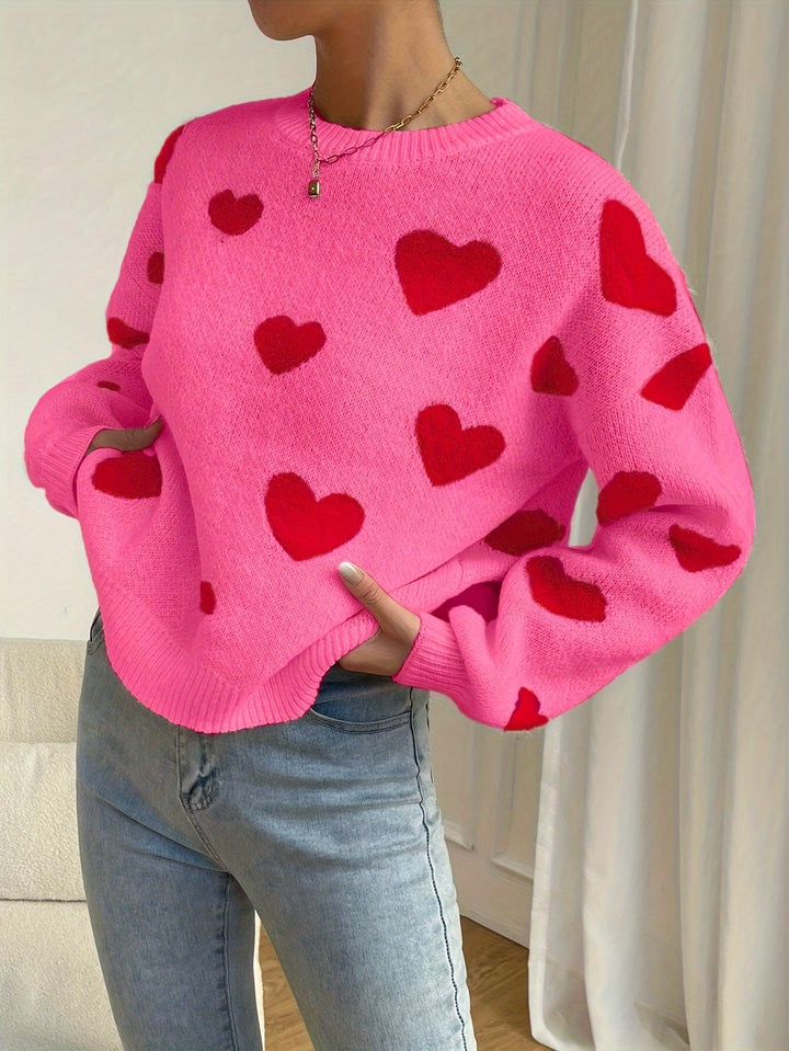 Sara | Roze trui met rood hartpatroon en ronde hals