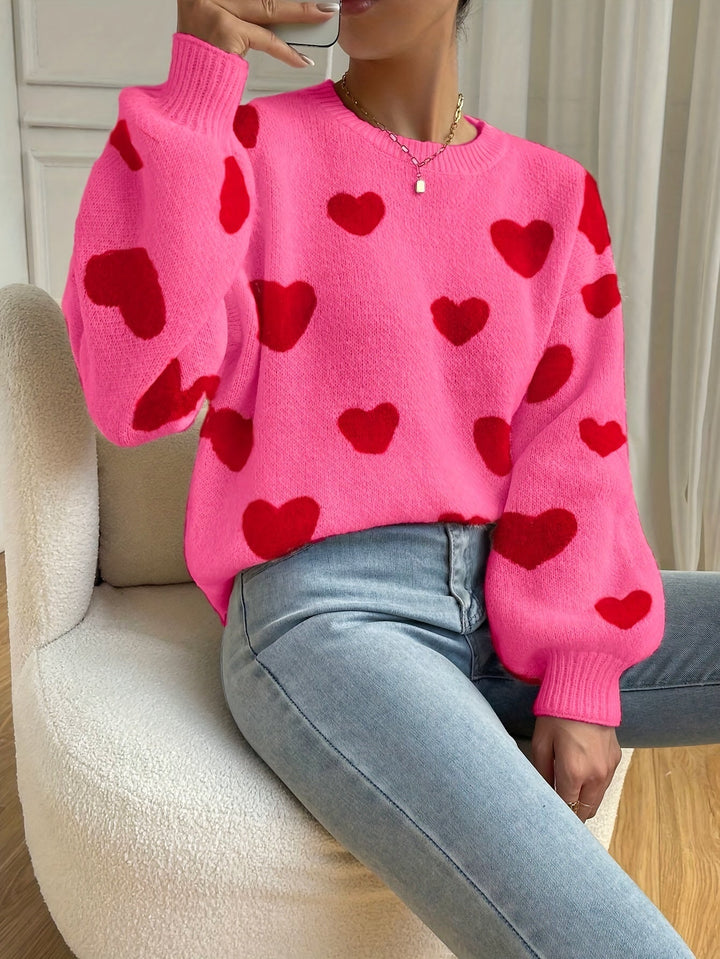 Sara | Roze trui met rood hartpatroon en ronde hals