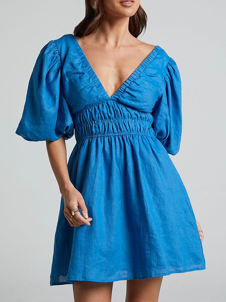 Sophie | Blauwe jurk met pofmouwen